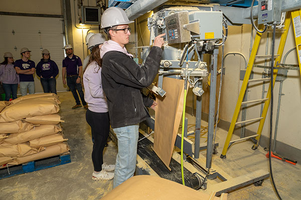Sam in pet food shirt